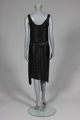 Lot 40 - A fine couture beaded cocktail gown, mid 1920s,...