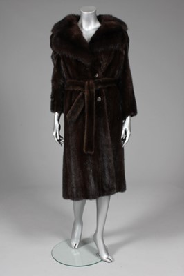 Lot 93 - A fine dark brown sable and mink coat, 1980s,...