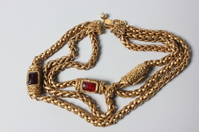 Lot 20 - A Chanel triple strand necklace, dated 1983,...