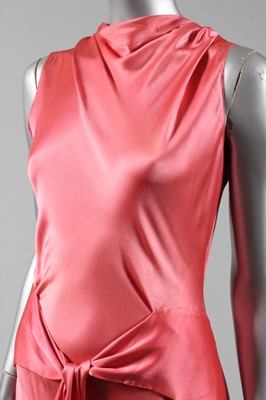 Lot 46 - A deep rose-pink satin bias cut couture...