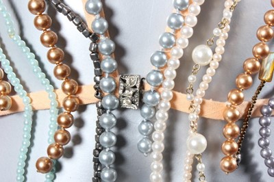 Lot 146 - A Maison Martin Margiela bead-necklace jacket,...