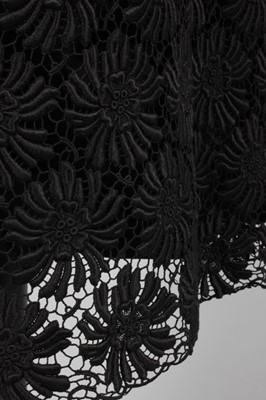 Lot 63 - A Balenciaga couture black lace cocktail dress,...
