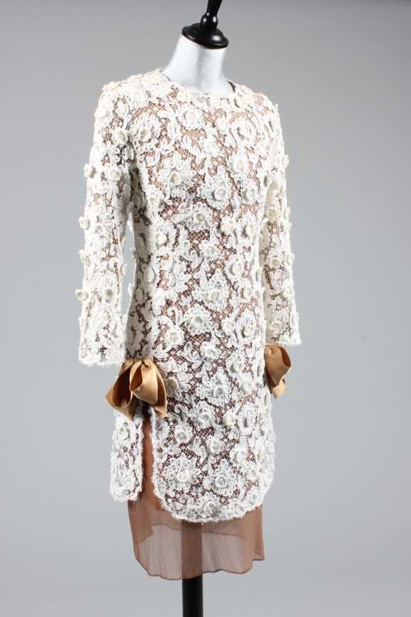 Lot 77 - A Balenciaga haute couture ivory soutache lace...