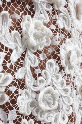 Lot 77 - A Balenciaga haute couture ivory soutache lace...