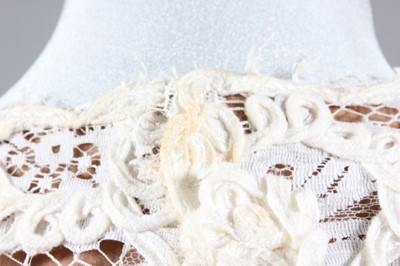 Lot 77 - A Balenciaga haute couture ivory soutache lace...
