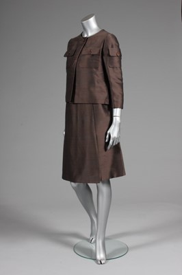 Lot 87 - A Balenciaga couture brown slubbed silk suit,...