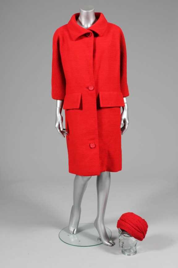 Lot 73 - A Balenciaga couture pillarbox-red ottoman...