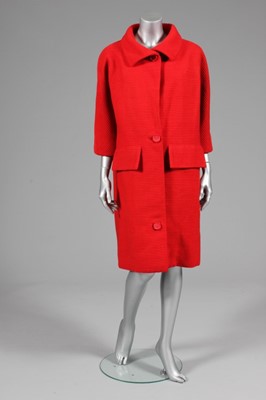 Lot 73 - A Balenciaga couture pillarbox-red ottoman...