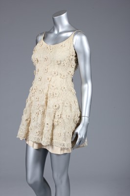 Lot 103 - A Lanvin ecru lace cocktail dress, early 1960s,...