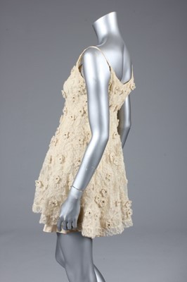 Lot 103 - A Lanvin ecru lace cocktail dress, early 1960s,...