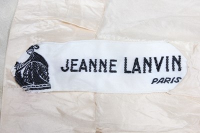 Lot 103 - A Lanvin ecru lace cocktail dress, early 1960s,...