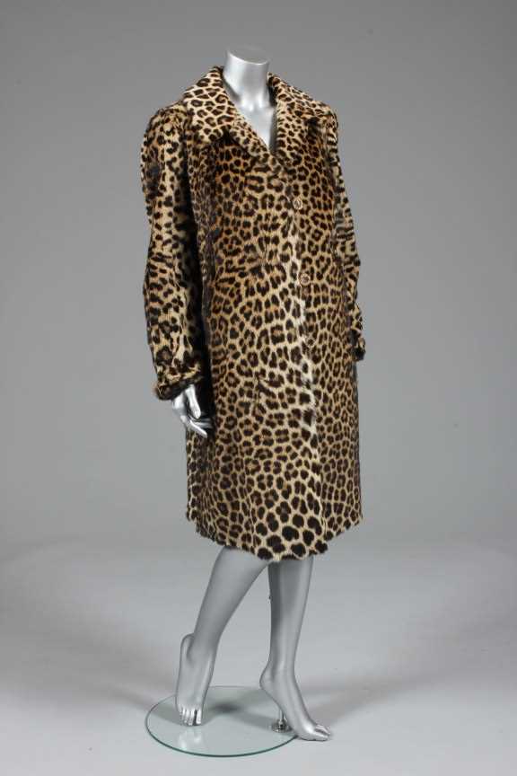 Lot 91 - A leopard skin coat and hat, 1960s,...