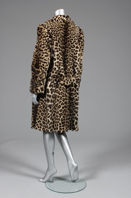 Lot 91 - A leopard skin coat and hat, 1960s,...