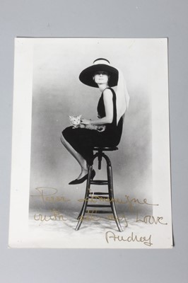 Lot 177 - An autographed photograph of Audrey Hepburn in...