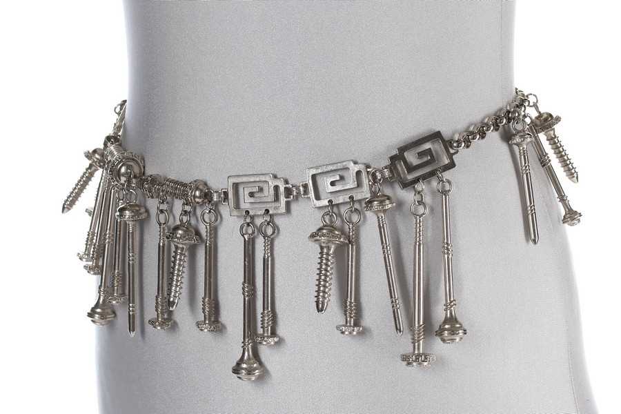 Click for high resolution Lot 214 - A Versace 'Nuts and Bolts' metal chain belt,...