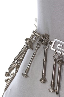 Lot 214 - A Versace 'Nuts and Bolts' metal chain belt,...