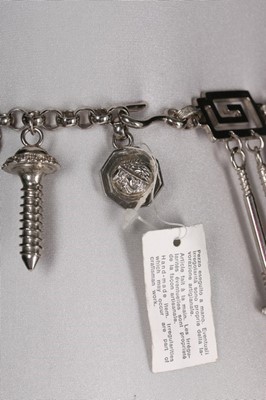 Lot 214 - A Versace 'Nuts and Bolts' metal chain belt,...