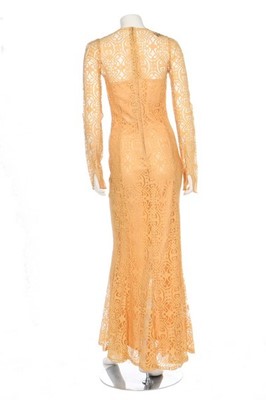 Lot 4 - A Biba yellow lace fishtail gown, early 1970s,...