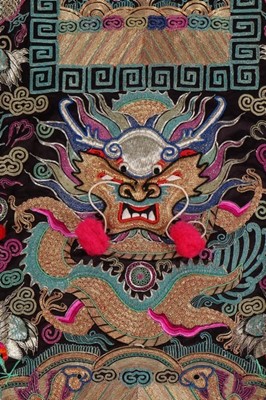 Lot 440 - A woman's embroidered xiapei and chaofu style...