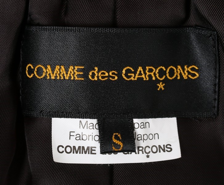 Lot 158 - A Comme des Garçons black pinafore dress,