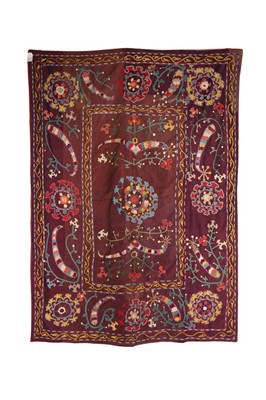 Lot 362 - An embroidered shot-purple silk suzani, Uzbek,...