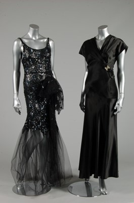 Lot 14 - A black sequined tulle evening gown, early...