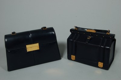 Lot 133 - Two stylish Fernandes Desgranges navy leather...