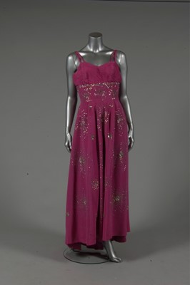 Lot 147 - A fuchsia pink faille ball gown, late 1950s,...