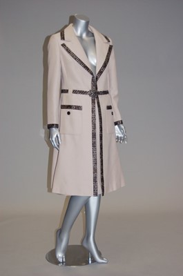 Lot 148 - A stylish Jean Patou beige wool ensemble,...