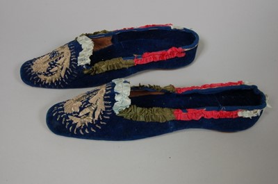 Lot 157 - A pair of Turkish embroidered ladies shoes for...