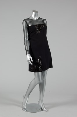 Lot 196 - A Givenchy couture black crepe mini dress, mid...