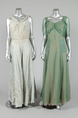 Lot 204 - A group of mainly 1950s larger size dresses,...