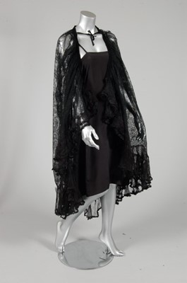 Lot 211 - A Chantilly lace shawl, 1860s, altered c.1900,...