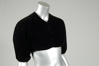 Lot 217 - A Balenciaga couture black velvet bolero...