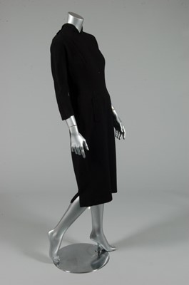 Lot 226 - A Schiaparelli black crepe dinner dress, 1930s,...