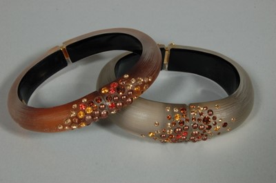 Lot 250 - A group of assorted bangles and bracelets,...