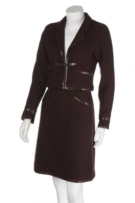 Lot 326 - A Chanel bordeaux-purple wool suit,...