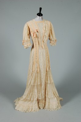 Lot 304 - An Edwardian Valenciennes lace gown, remounted...