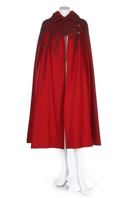 Lot 129 - A scarlet wool cape with couched black and...