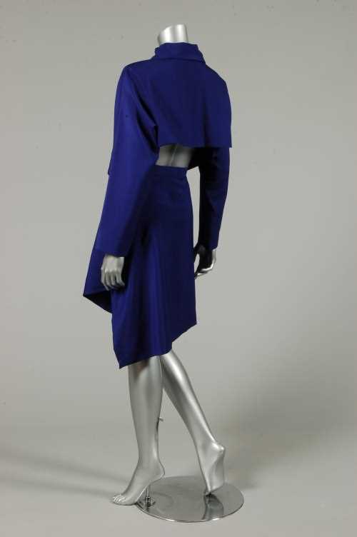 Issey Miyake multi material suit with lace cutouts