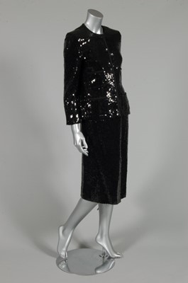 Lot 34 - A Chanel boutique black sequined cocktail suit,...