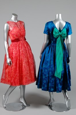 Lot 407 - Four cocktail/summer dresses, 1950s, and an...