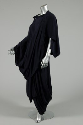 Lot 409 - A Comme des Garcons navy crepe dress, probably...