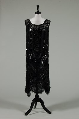 Lot 4 - A black sequined and beaded flapper dress,...