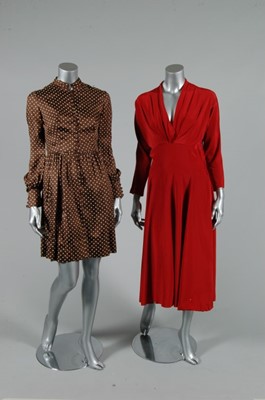 Lot 55 - A group of designer suits and day dresses,...