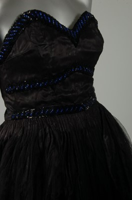 Lot 59 - A late Callot Soeurs couture cirsatin and...