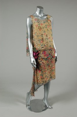 Lot 103 - A printed chiffon and rhinestone studded...