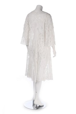 Lot 100 - An ivory silk damask kimono-style robe, 1920s,...
