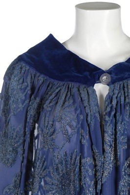 Lot 103 - A royal blue cut-velvet cape, circa 1930,...