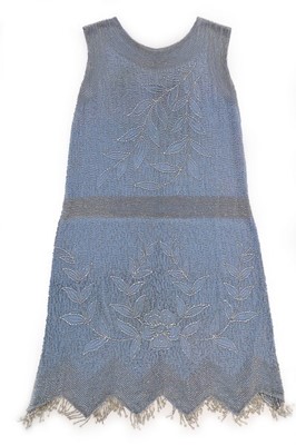 Lot 112 - A powder-blue beaded muslin flapper dress,...